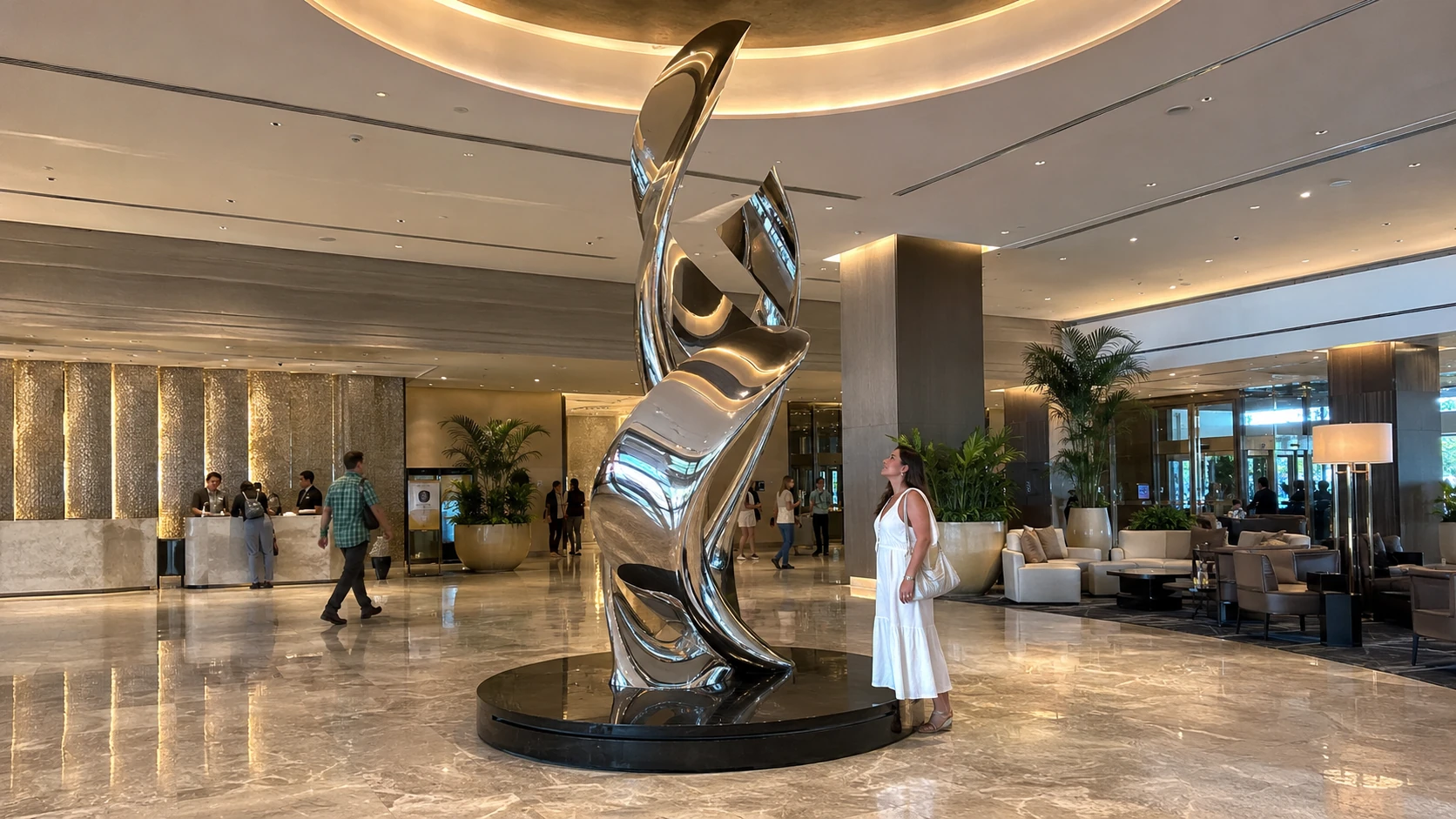 Mirror polished stainless steel sculpture installed in a luxury hotel lobby